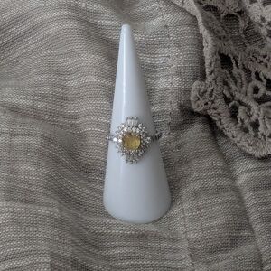 Elegant Silver and Yellow Gemstone Ring
